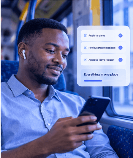 A commuter approving a leave request and replying to a client from his phone on the bus